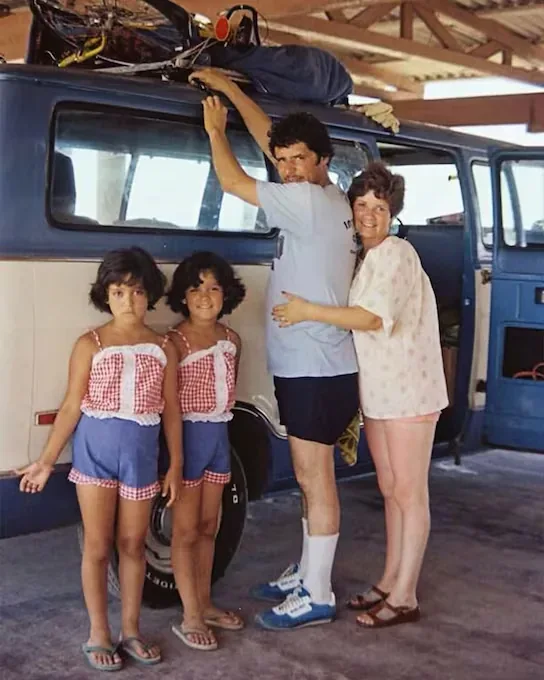 Julieta Venegas in a childhood photo with her parents and her twin sister Yvonne Venegas.