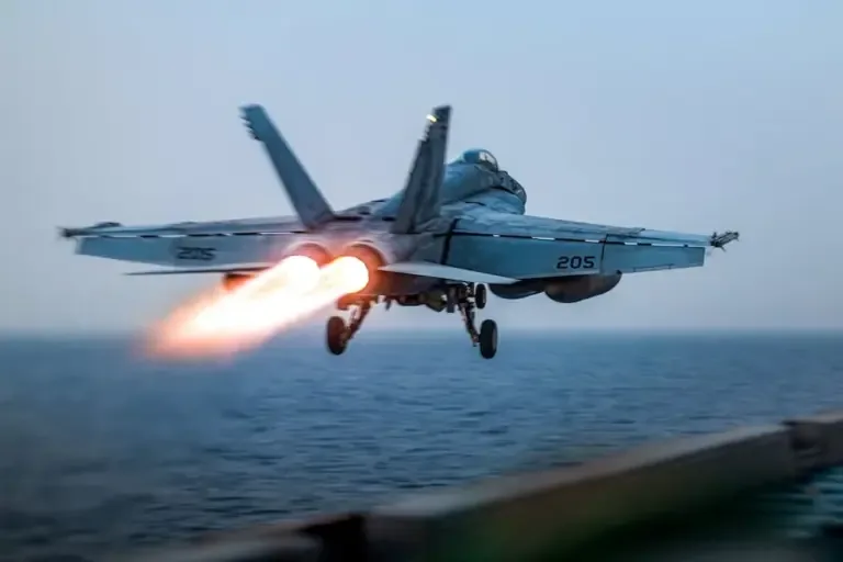 A U.S. F/A-18 Super Hornet attack fighter takes off from the Nimitz-class aircraft carrier USS Harry S. Truman on March 16, 2025. (Photo by Darren CORDOVIZ / DVIDS / AFP).