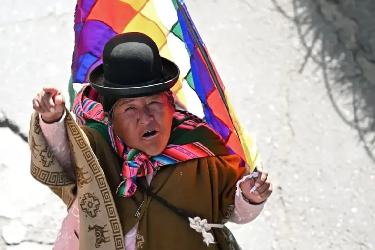 An indigenous woman participates in a protest against the government of President Rodrigo Paz during Mother's Day in La Paz, Bolivia, on May 27, 2026. (Photo by Marvin RECINOS / AFP).