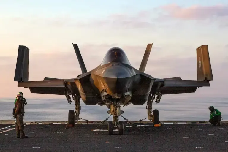 An F-35C Lightning II, assigned to the US Marine Corps Attack Fighter Squadron (VMFA) 314, chained on the flight deck of the USS Abraham Lincoln aircraft carrier in support of Operation Epic Fury against Iran. (AFP).