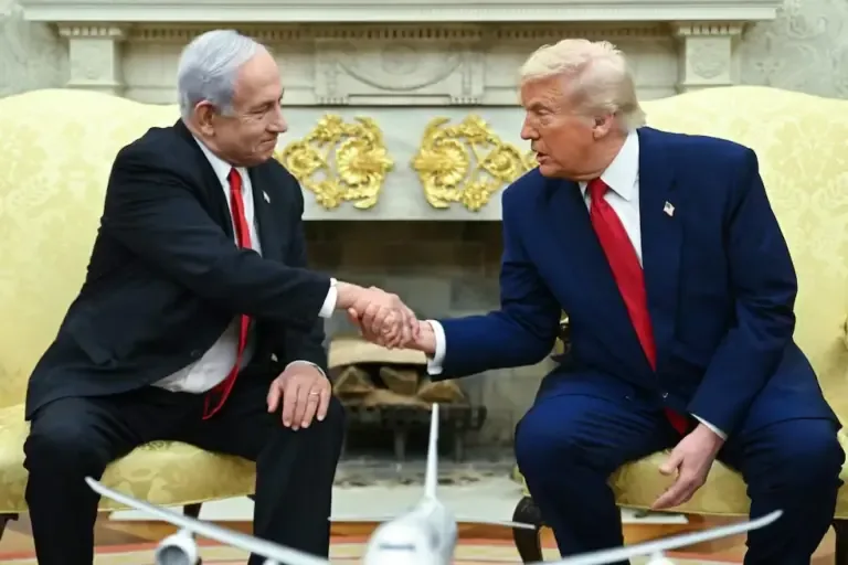 U.S. President Donald Trump shakes hands with Israeli Prime Minister Benjamin Netanyahu during a meeting in the Oval Office of the White House, April 7, 2025. (Photo by SAUL LOEB / AFP).