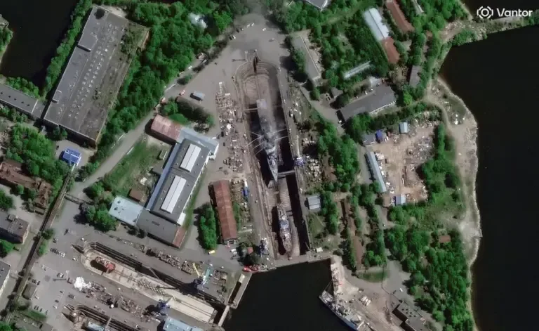 A column of smoke rises from the Kronstadt military base, in northwestern Russia, after the Ukrainian drone attack. (Satellite image ©2026 Vantor / AFP).