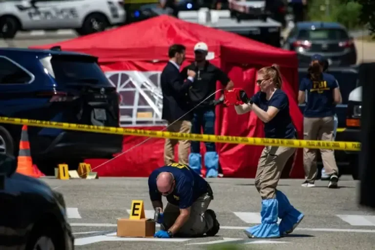 FBI investigators work at the scene of a suspected shooting involving ICE in Biddeford, Maine, July 13, 2026. Photo: JOSEPH PREZIOSO / AFP
