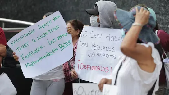 Relatives of Peruvian compatriots who were taken to Russia under false pretenses to then join the war protest outside the Ministry of Foreign Affairs