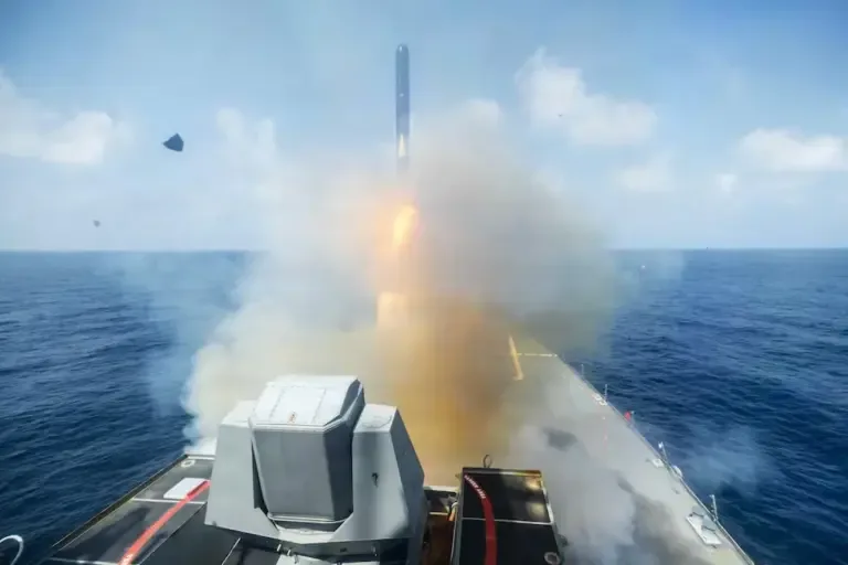 In this U.S. Navy photograph, published on February 28, 2026, an Arleigh Burke-class guided missile destroyer fires Tomahawk missiles during Operation Epic Fury against Iran. (CENTCOM) / AFP).