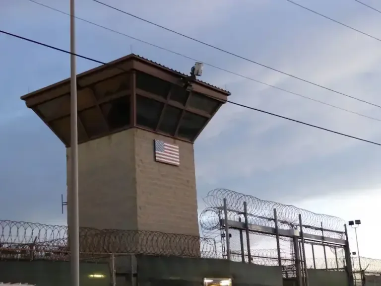 In this archive photo taken on October 16, 2018, the main gate of the Guantánamo prison at the U.S. Naval Base in that location in Cuba is seen. (Photo by Sylvie LANTEAUME / AFP).