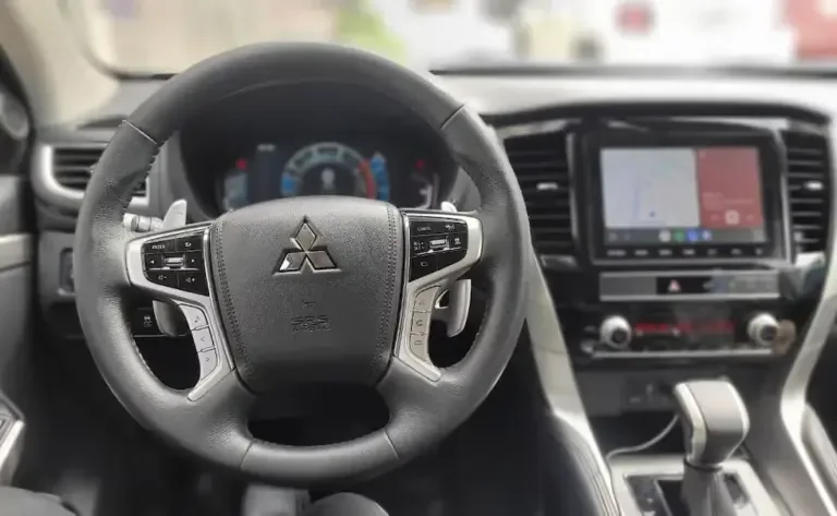 The steering wheel is leather-wrapped, adjustable in height and depth, and has audio controls. (Photo: Fernando Roca)