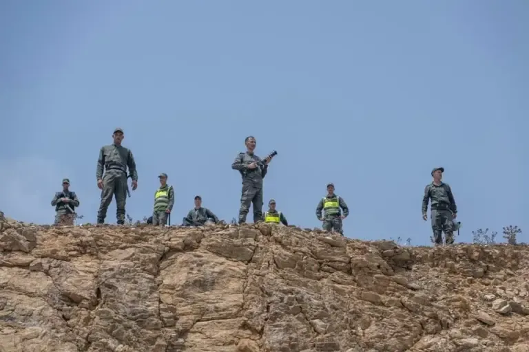 Members of the Moroccan Auxiliary Forces secure the area around the Bab Sebta border crossing, near Fnideq, Morocco, on July 31, 2026. (EFE/EPA/JALAL MORCHIDI)