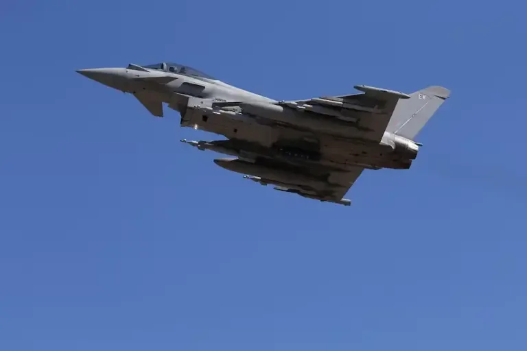 A Eurofighter Typhoon combat aircraft of the British Royal Air Force taking off from the RAF base in Akrotiri, Cyprus, for a coalition mission over Iraq, on September 22, 2016. (Photo by Petros Karadjias / POOL / AFP)