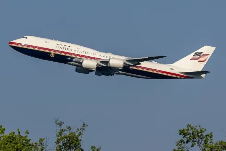 President Donald Trump departs aboard the newly designated Air Force One, a Boeing 747-8 that previously operated as Qatar's executive jet, on July 3, 2026. (Photo by Brett Johnsen/NurPhoto via AFP).