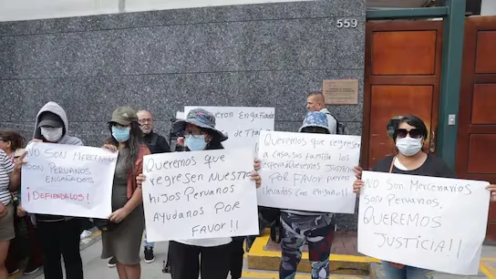 Relatives of Peruvian compatriots who were taken to Russia under false pretenses to then join the war protest outside the Ministry of Foreign Affairs