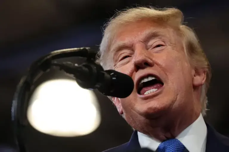 The President of the United States, Donald Trump, delivers a speech at the David S. Mack Center for Training and Intelligence on August 14, 2026, in Garden City, New York. (Photo by Samuel Corum / GETTY IMAGES NORTH AMERICA via AFP).