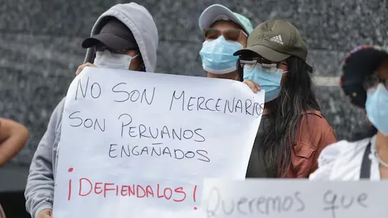 Relatives of Peruvian compatriots who were taken to Russia under false pretenses to then join the war protest outside the Ministry of Foreign Affairs
