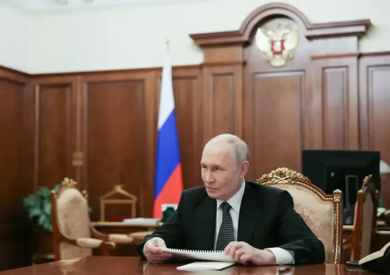 Russian President Vladimir Putin attends a meeting with the CEO of the Russian state diamond giant Alrosa in Moscow on August 4, 2026. (Photo by Alexander KAZAKOV / AFP).