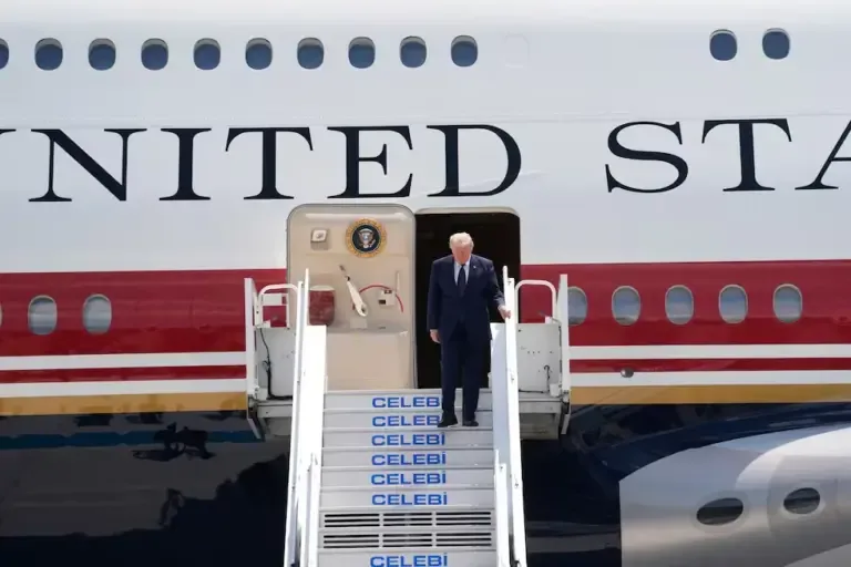 U.S. President Donald Trump disembarks from Air Force One upon arrival at Etimesgut air base, near Ankara, on July 7, 2026. (Photo by Osmancan Gürdoğan / AFP).