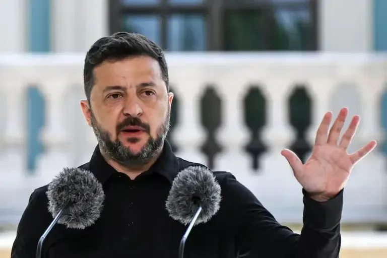 Ukrainian President Volodymyr Zelensky speaks during a press conference in the gardens of the Presidential Palace on July 16, 2026. (Photo by Genya Savilov / AFP).