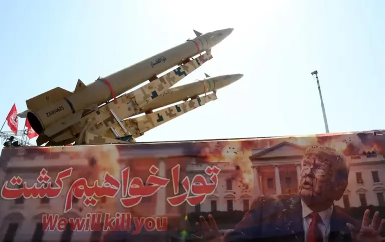 Iranian Zolfaghar missiles are displayed over a banner with the image of U.S. President Donald Trump in Azadi Square, Tehran, Iran, on July 30, 2026. (EFE/EPA/ABEDIN TAHERKENAREH).