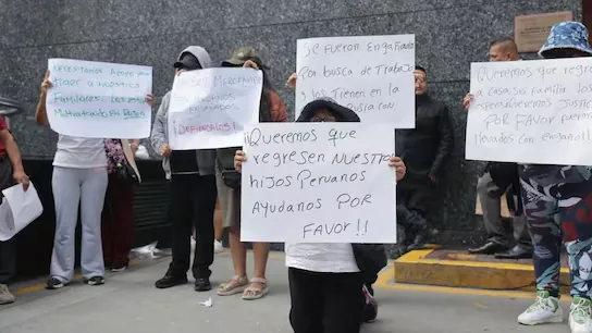 Relatives of Peruvian compatriots who were taken to Russia under false pretenses to then join the war protest outside the Ministry of Foreign Affairs
