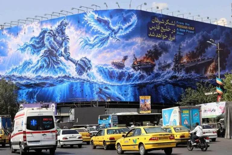 On September 14, 2026, Iranian citizens passed by a huge anti-American billboard with the slogan in Persian: