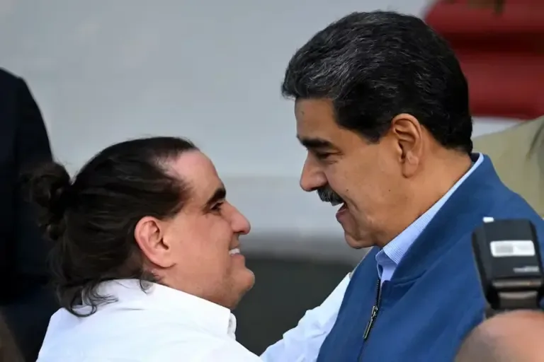 Venezuelan President Nicolás Maduro receives Colombian businessman Alex Saab at the Miraflores Presidential Palace in Caracas on December 20, 2023. (Photo by Federico Parra / AFP)