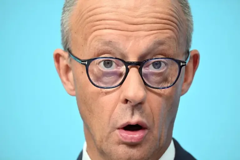 The Chancellor of Germany and leader of the Christian Democratic Union (CDU), Friedrich Merz, reacts during a press conference in Berlin on September 7, 2026, one day after the elections in the state of Saxony-Anhalt. (Photo by RALF HIRSCHBERGER / AFP).
