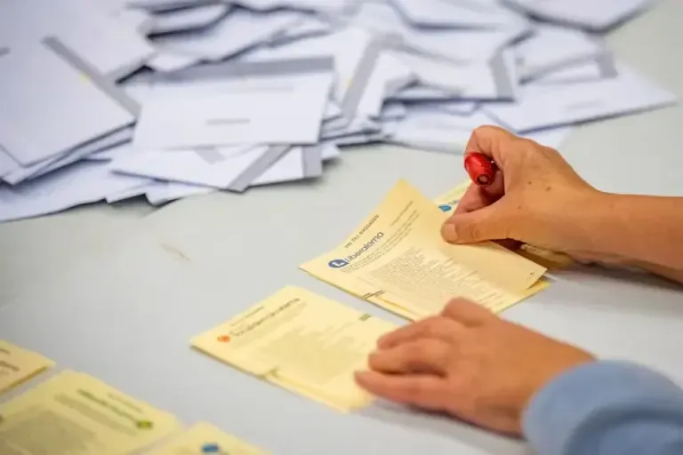 Voting envelopes are opened while votes are counted at the Kockums Fritid polling station in Malmö, during the general elections in Sweden to be held on September 13, 2026, in Stockholm. Photo: JOHAN NILSSON / TT NEWS AGENCY / AFP