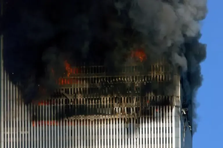 Smoke and flames rise from the Twin Towers before their collapse on September 11, 2001, in New York. (AFP PHOTO Henny Ray ABRAMS).